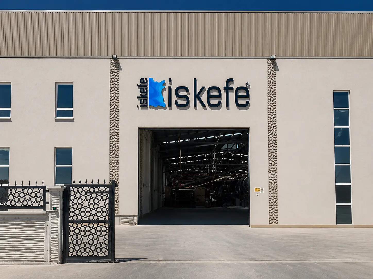 İskefe factory entrance with dimensional logo signage above the main opening