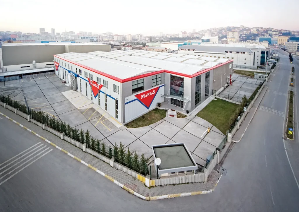 Aerial view of the Martaş factory featuring large-scale exterior signage