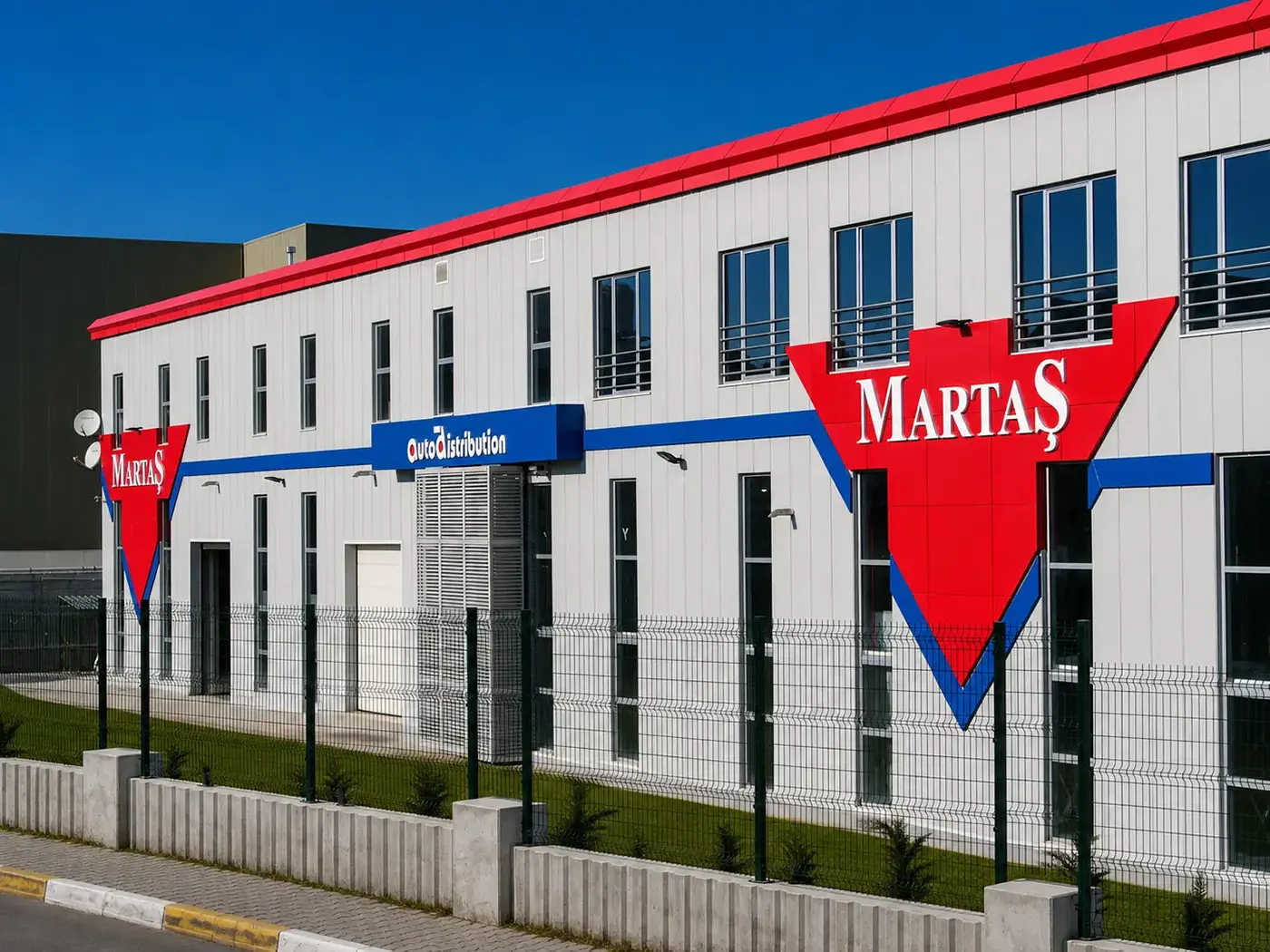 Martaş industrial building with multiple coordinated façade signs