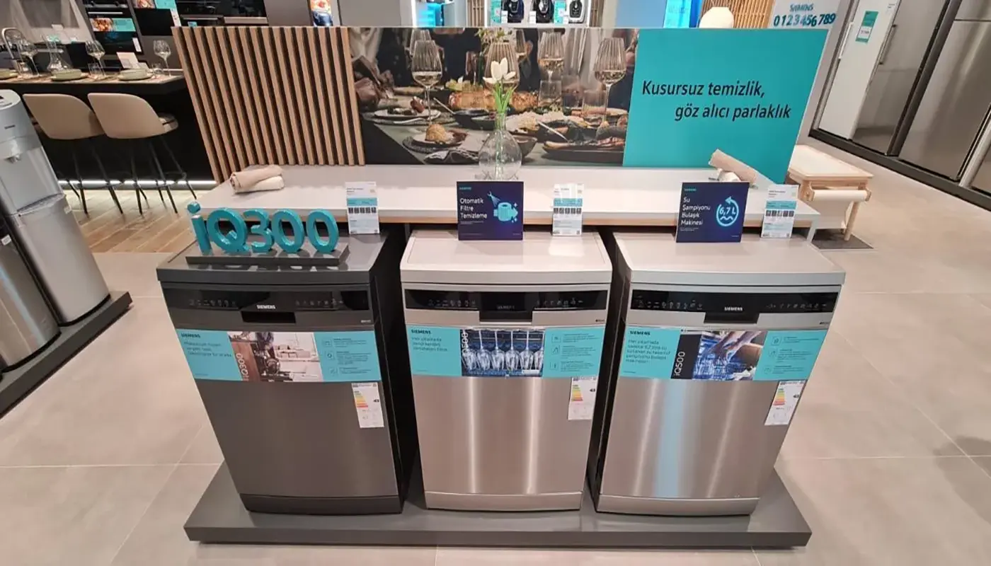Siemens dishwasher campaign display wall showing a complete coordinated retail communication installation