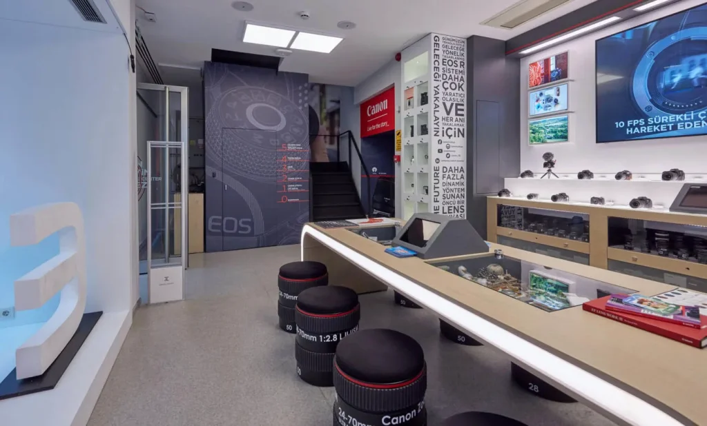 Canon Sirkeci store interior with three-dimensional EOS window lettering and illuminated product graphics