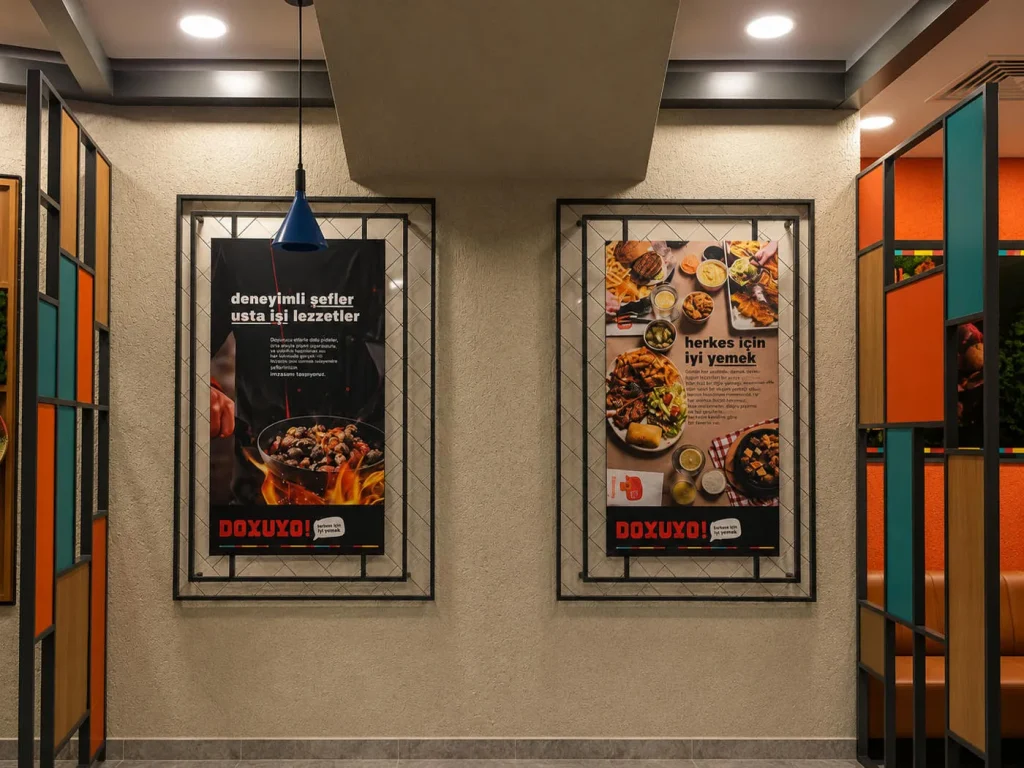 Doyuyo restaurant interior featuring framed UV-printed promotional wall graphics