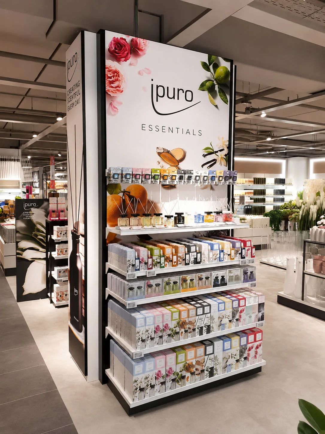 iPuro SEG fabric frame integrated into an in-store fragrance display