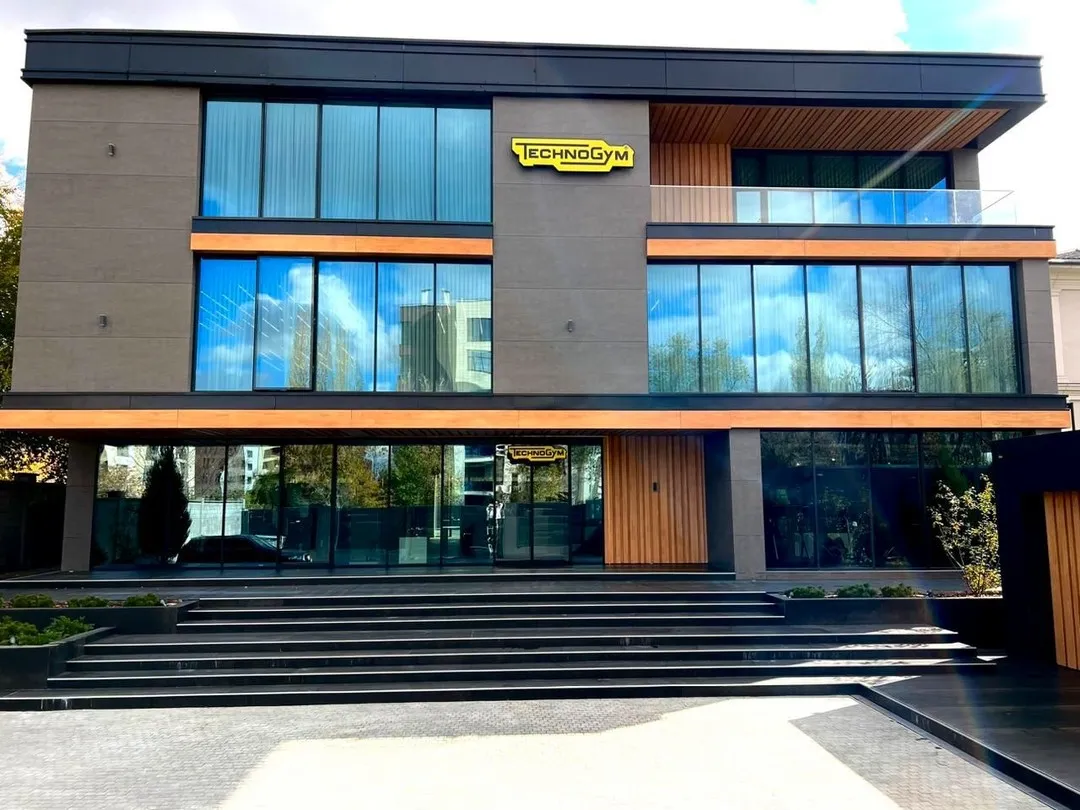 Technogym building exterior with illuminated brand sign