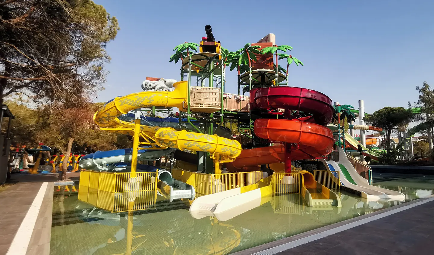 Colourful water slides manufactured with UV-printed industrial fabric and polyester resin