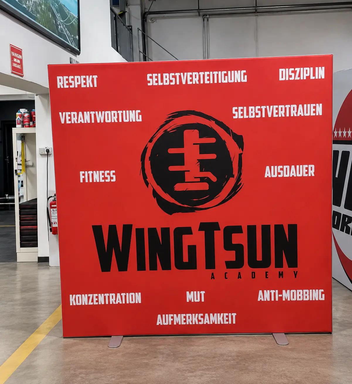 WingTsun Academy branded display frame standing on two support feet